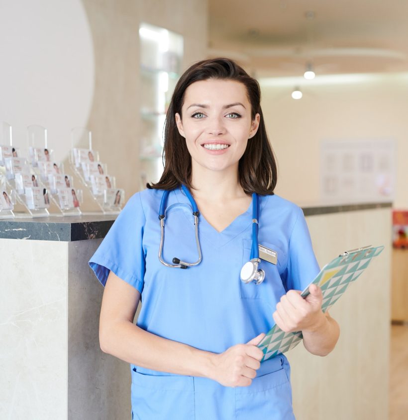 female-nurse-posing-in-clinic.jpg